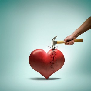 Hammer breaking a heart